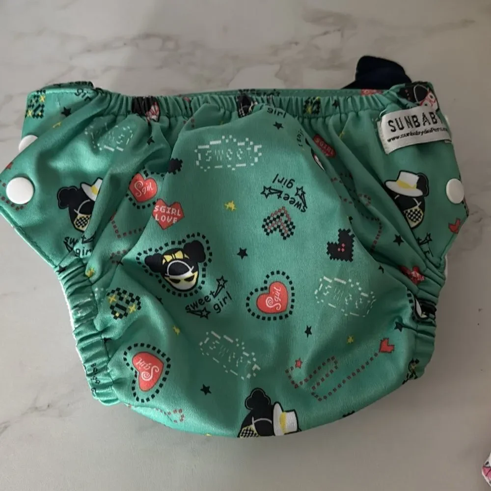 Bundle of 6 SUNBABY  Cloth Diapers EUC